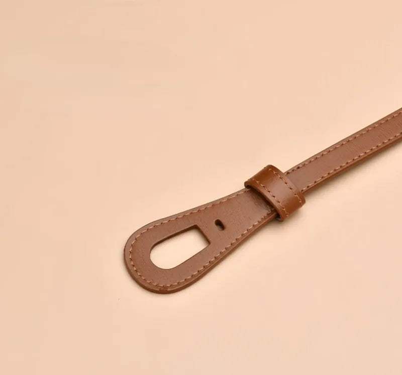 Ceinture sur robe noire CeinturesCuir